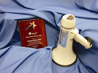 Award recipients received a plaque and a megaphone symbolizing their communications and advocacy efforts.