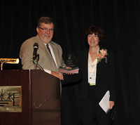 Lori Baker-Stone, R.N., Vice President of Nursing, accepts the 2012 Community Health Improvement Award on behalf of Sound Shore Medical Center's Outpatient Pediatric Immunization Program. Presenting the award is HANYS' Chairman of the Board, Joseph McDonald. Lori Baker-Stone, R.N., Vice President of Nursing, accepts the 2012 Community Health Improvement Award on behalf of Sound Shore Medical Center's Outpatient Pediatric Immunization Program. Presenting the award is HANYS' Chairman of the Board, Joseph McDonald.