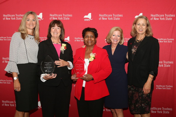 HTNYS recognized Sharon Hanson of Erie County Medical Center Corporation and Mary Gail Biebel of Columbia Memorial Health with the annual HTNYS Trustee Leadership and Advocacy Award. Pictured (from left): HTNYS Executive Director Sue Ellen Wagner; Mary Gail Biebel; Sharon Hanson; Sharon Norton Remmer, Chairwoman, HTNYS Board of Governors and Past Board Chairwoman and Trustee at Brookhaven Memorial Hospital Medical Center; and Beatrice Grause, President, HANYS. HTNYS recognized Sharon Hanson of Erie County Medical Center Corporation and Mary Gail Biebel of Columbia Memorial Health with the annual HTNYS Trustee Leadership and Advocacy Award. Pictured (from left): HTNYS Executive Director Sue Ellen Wagner; Mary Gail Biebel; Sharon Hanson; Sharon Norton Remmer, Chairwoman, HTNYS Board of Governors and Past Board Chairwoman and Trustee at Brookhaven Memorial Hospital Medical Center; and Beatrice Grause, President, HANYS.